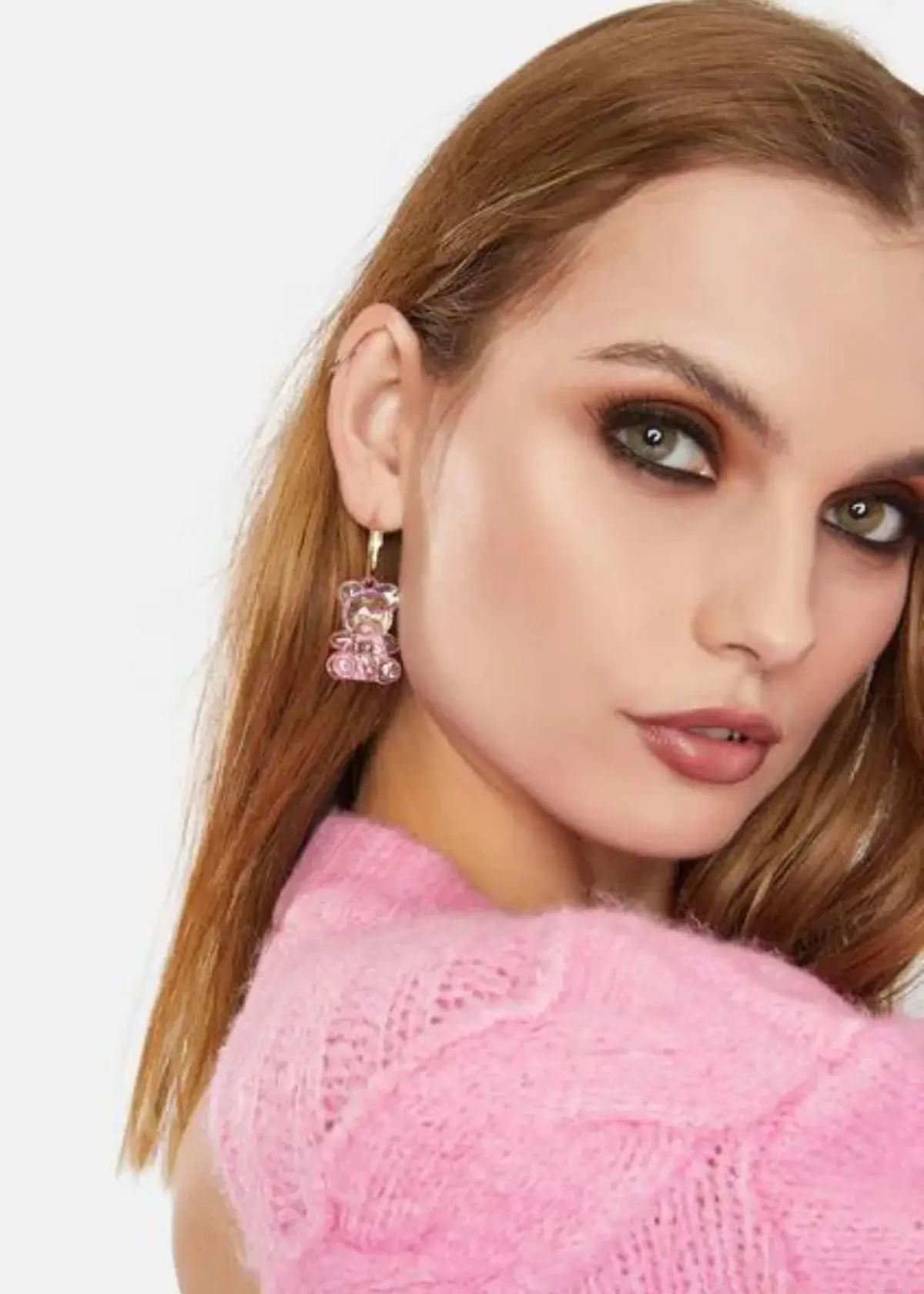 What materials are typically used to make bear earrings?