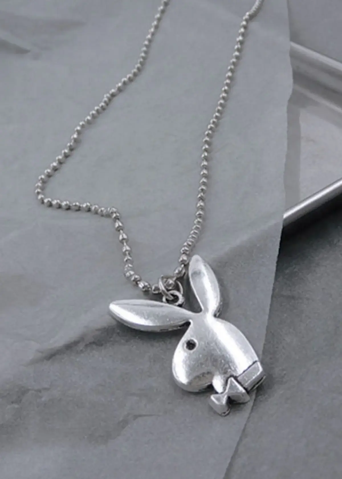 What materials are used to make bunny necklaces?
