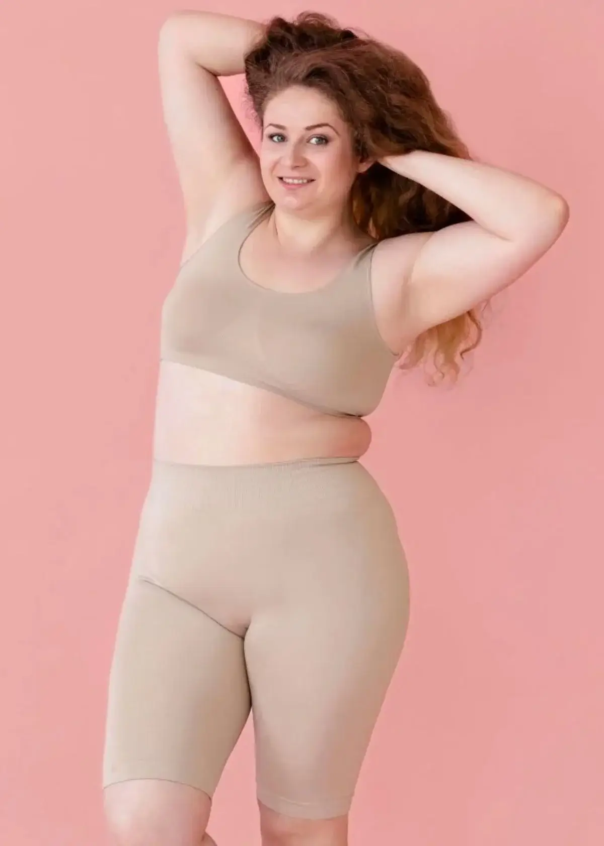 How should I put on plus-size shapewear correctly?