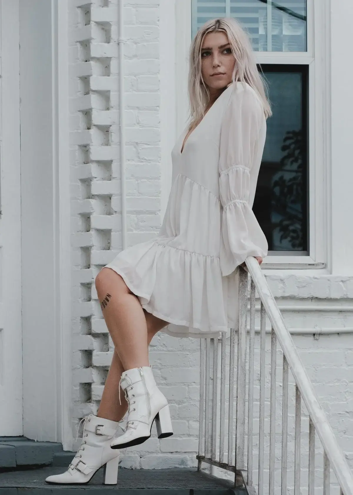 What are white cowboy boots made of?