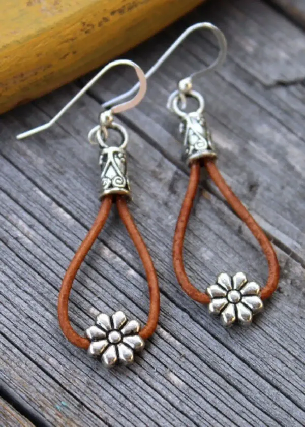 What types of ear findings are used for Cowgirl Earrings?