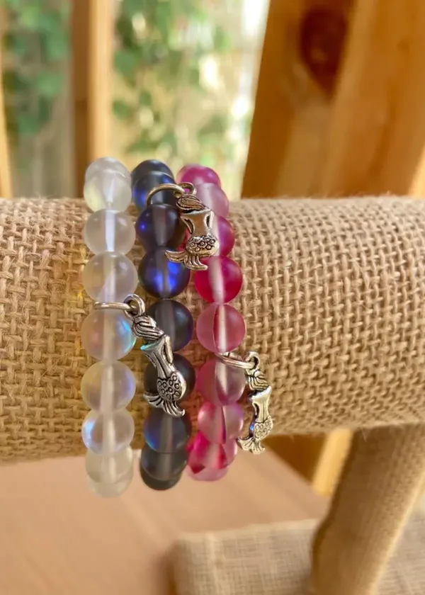Mermaid Glass Bracelet: A Beacon of Femininity, A Reservoir of Love, and the Journey Beyond